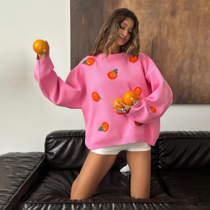Kvinnors oversize-tröja med färgglada broderidetaljer Mirla-Eva Jonsson