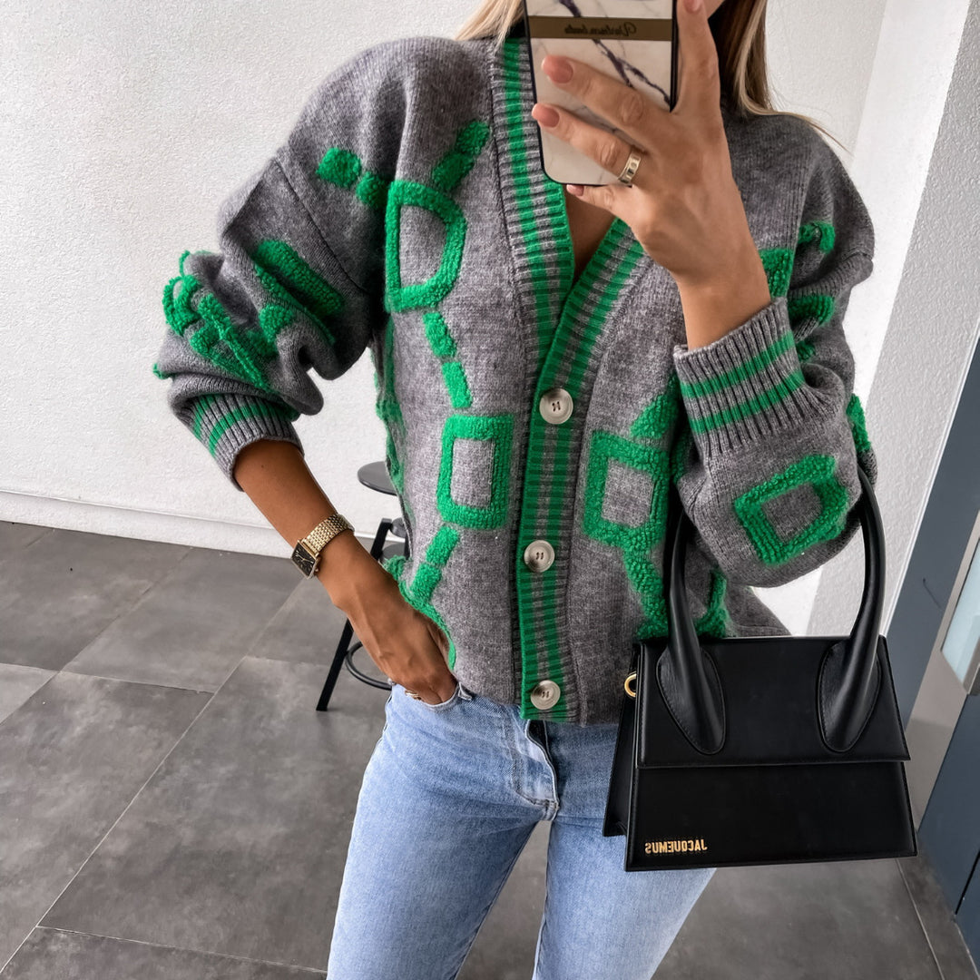 Kvinnors oversized cardigan med färgglad geometrisk mönster Mirla-Eva Jonsson