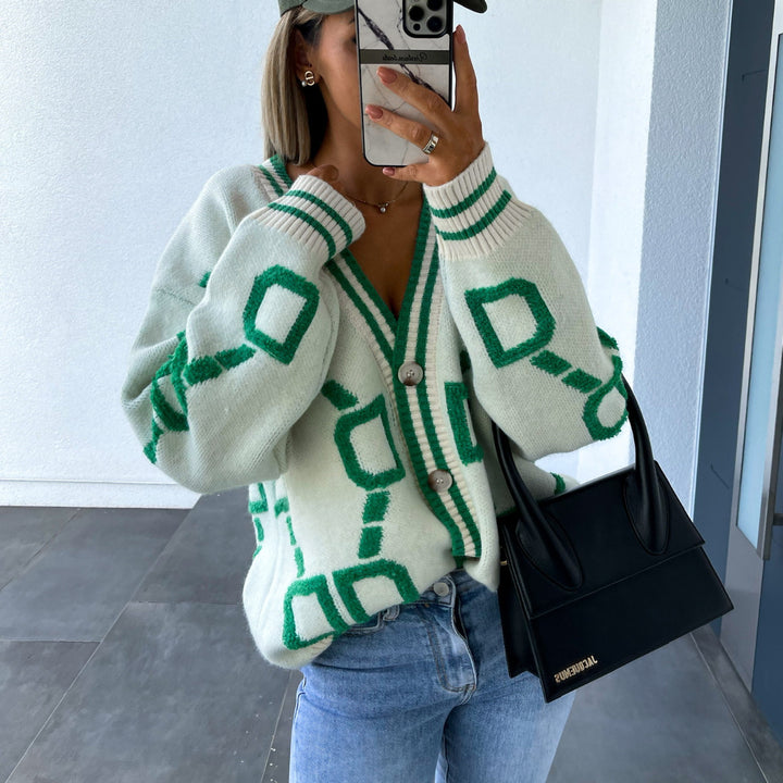 Kvinnors oversized cardigan med färgglad geometrisk mönster Mirla-Eva Jonsson