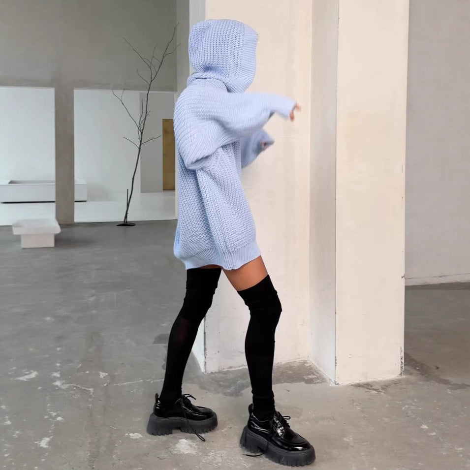 Kvinnors oversized cardigan med knäppt design och mjukt material Mirla-Eva Jonsson