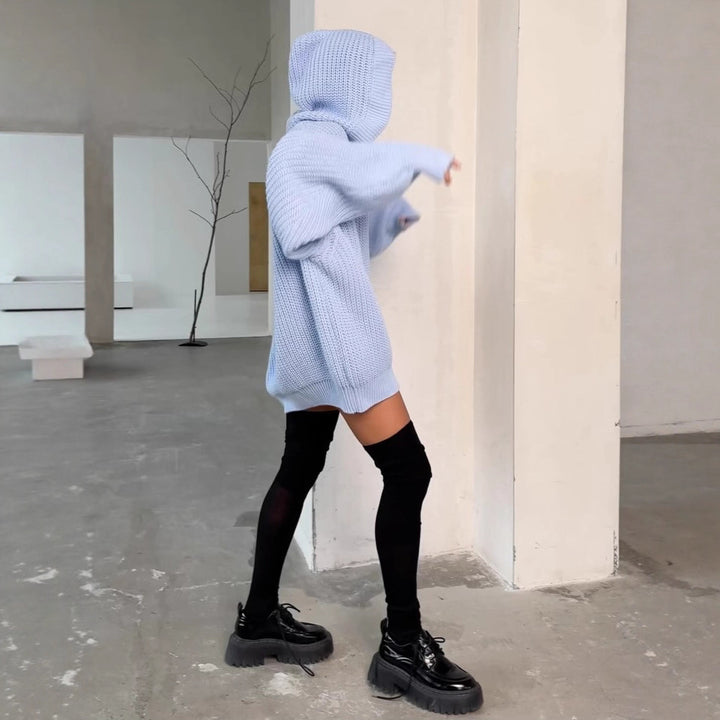 Kvinnors oversized cardigan med knäppt design och mjukt material Mirla-Eva Jonsson