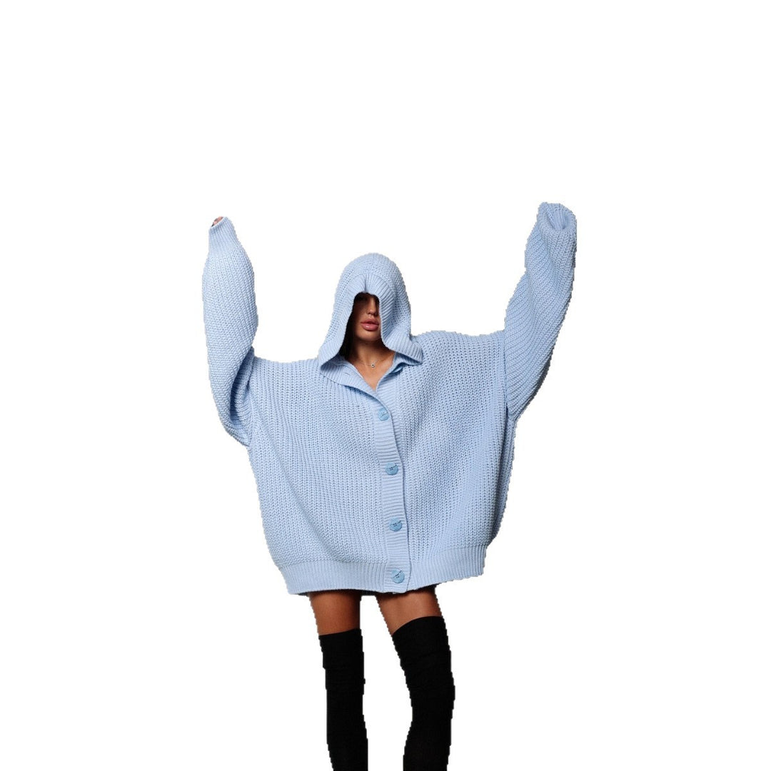 Kvinnors oversized cardigan med knäppt design och mjukt material Mirla-Eva Jonsson
