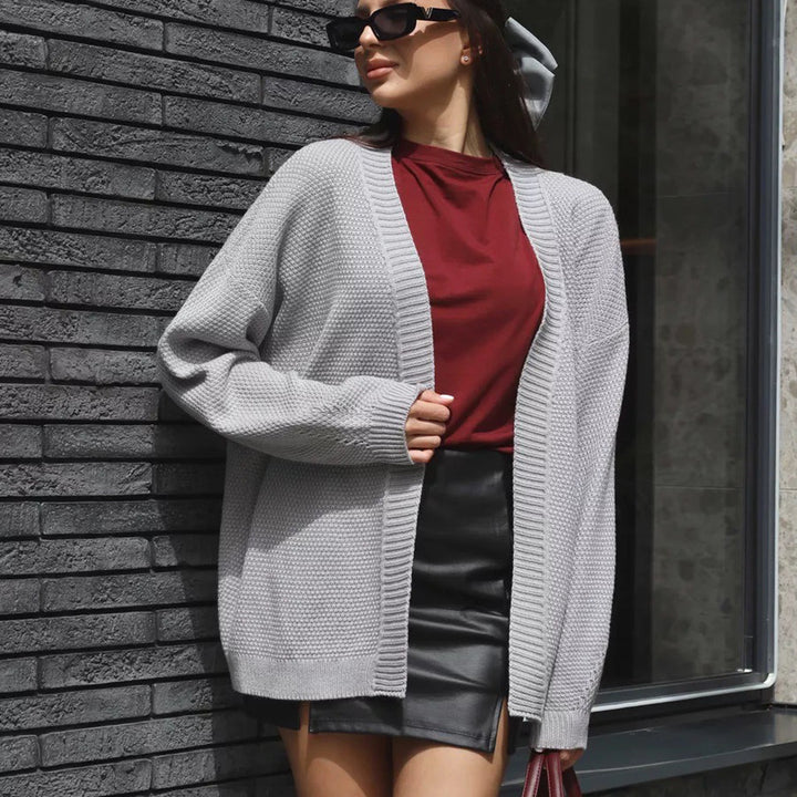 Kvinnors oversized cardigan med texturerat mönster och vida ärmar Mirla-Eva Jonsson