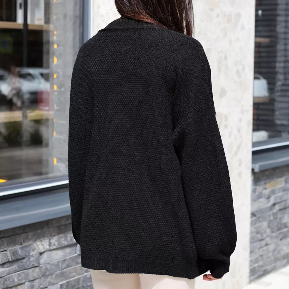 Kvinnors oversized cardigan med texturerat mönster och vida ärmar Mirla-Eva Jonsson