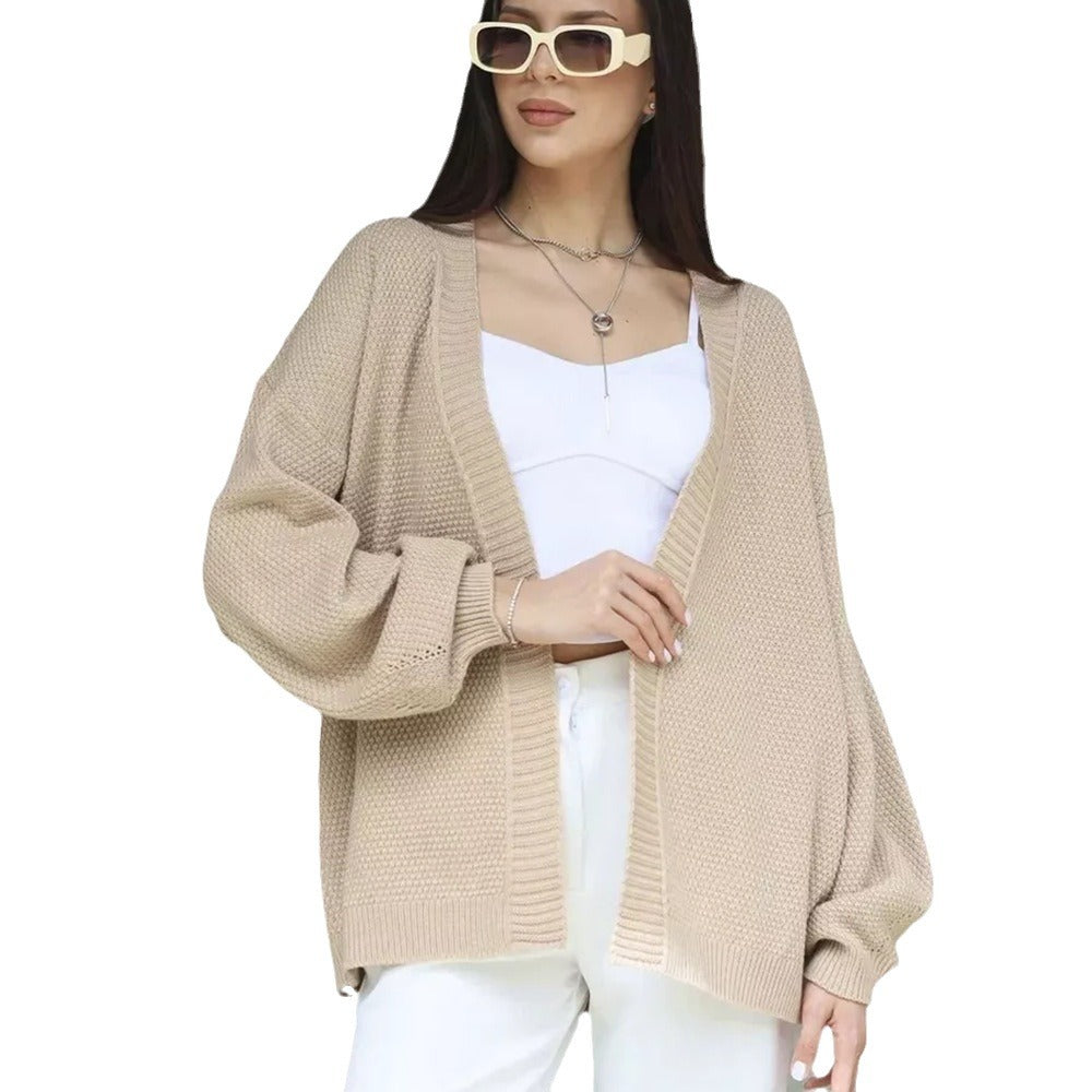 Kvinnors oversized cardigan med texturerat mönster och vida ärmar Mirla-Eva Jonsson