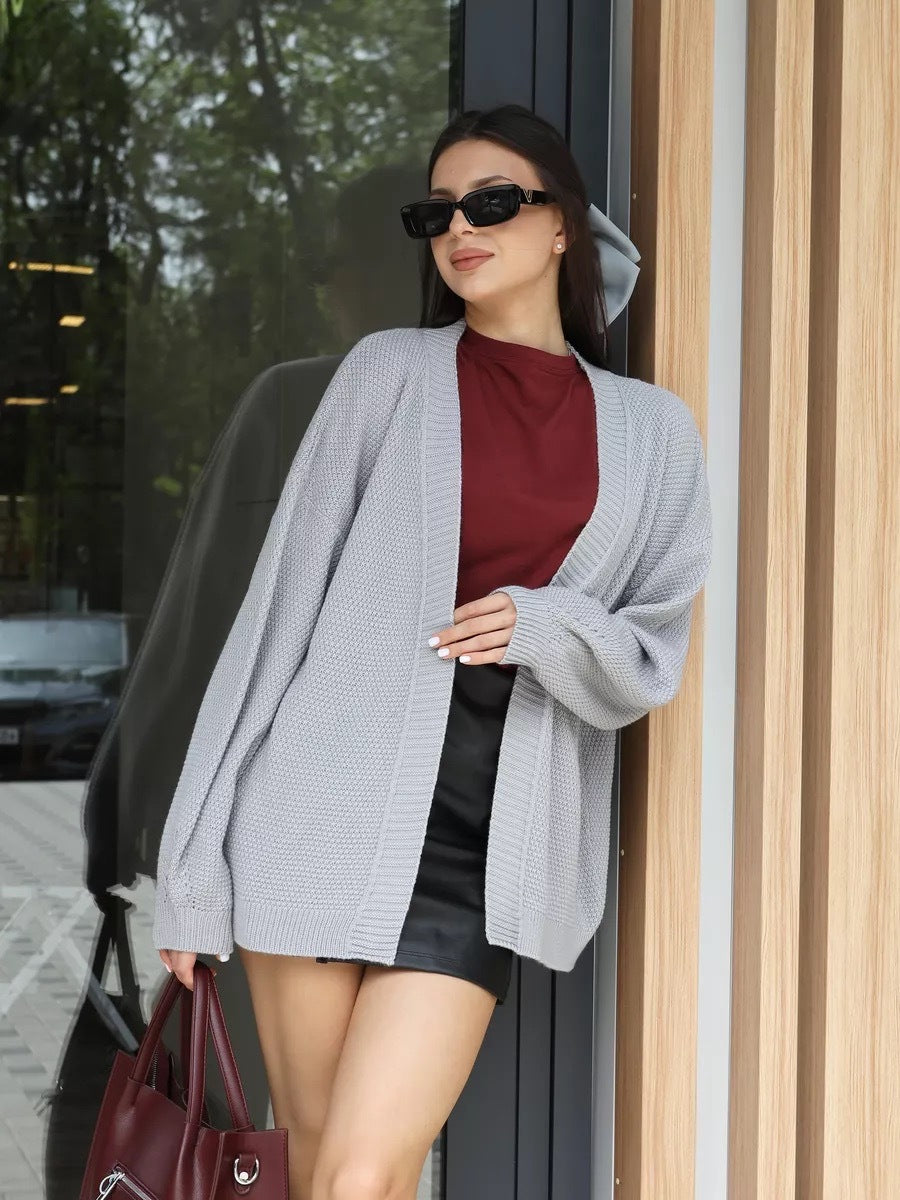 Kvinnors oversized cardigan med texturerat mönster och vida ärmar Mirla-Eva Jonsson