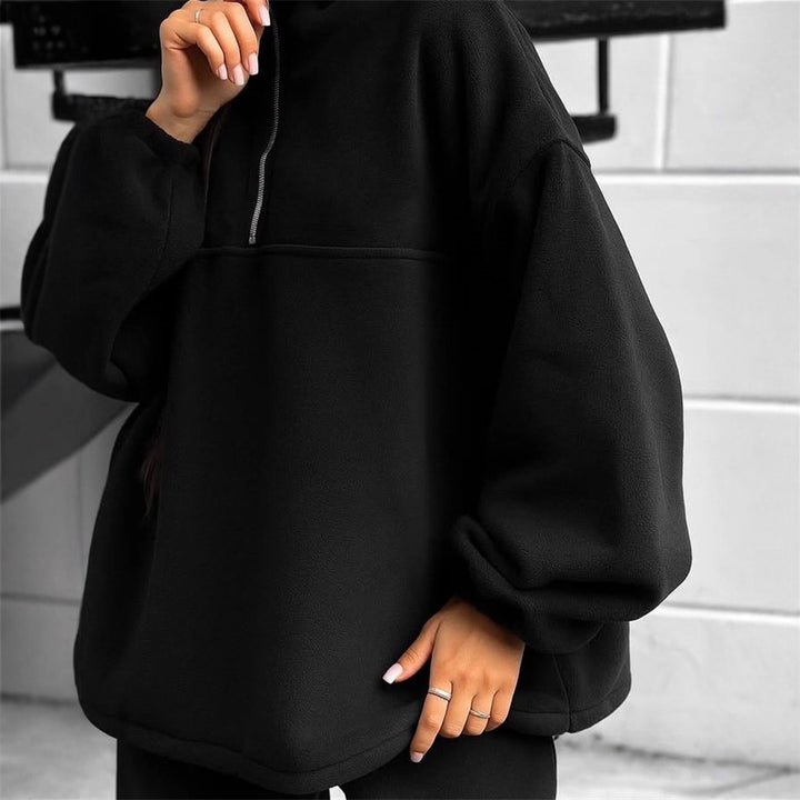 Kvinnors oversized fleece jumpsuit med hög krage och dragkedja Mirla-Eva Jonsson