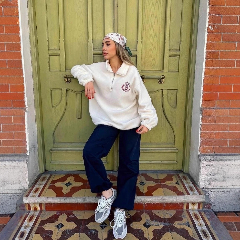Kvinnors oversized fleece-tröja med dragkedja och broderad logotyp Mirla-Eva Jonsson