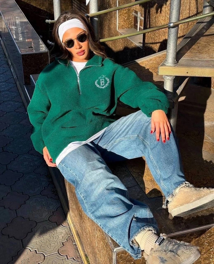 Kvinnors oversized fleece-tröja med dragkedja och broderad logotyp Mirla-Eva Jonsson