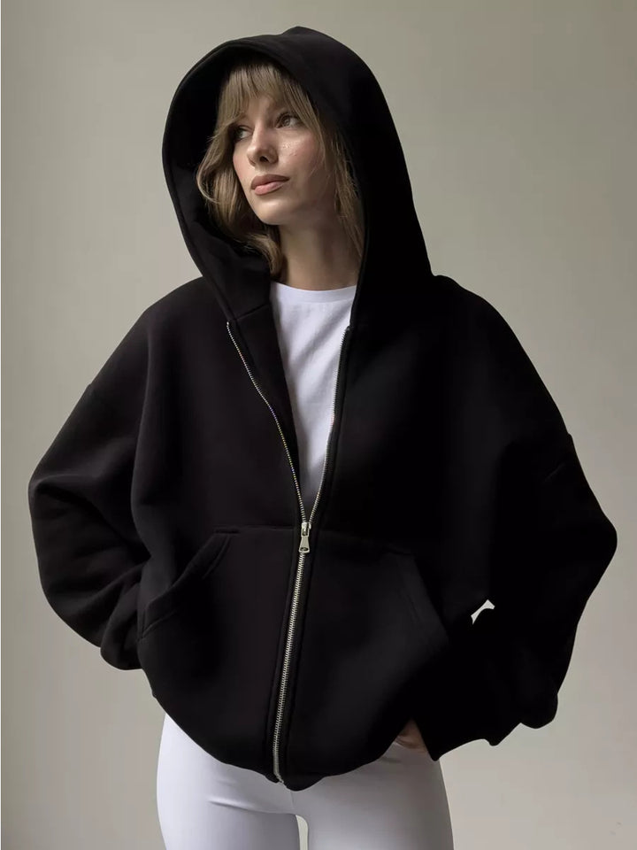 Kvinnors oversized hoodie med dragkedja och stora fickor Mirla-Eva Jonsson