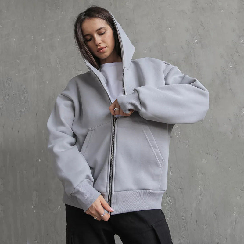 Kvinnors oversized hoodie med dragkedja och stora fickor Mirla-Eva Jonsson