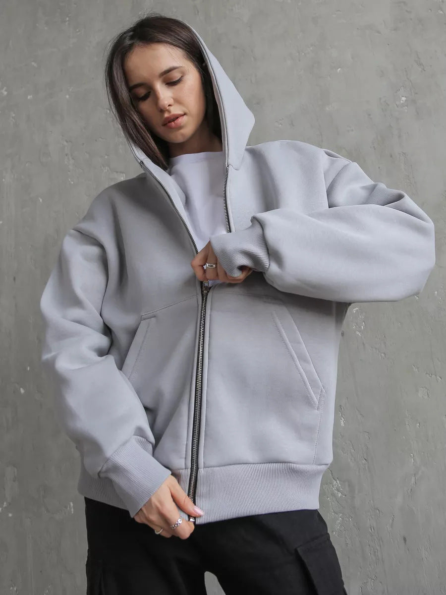 Kvinnors oversized hoodie med dragkedja och stora fickor Mirla-Eva Jonsson