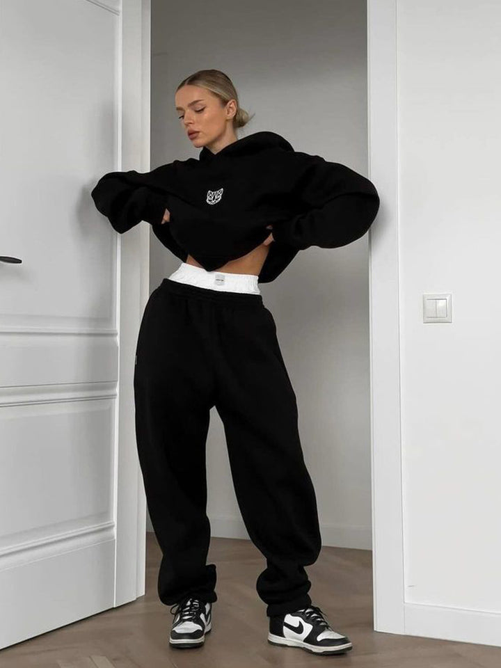 Kvinnors oversized hoodie med elastisk midja och bred skärning Mirla-Eva Jonsson