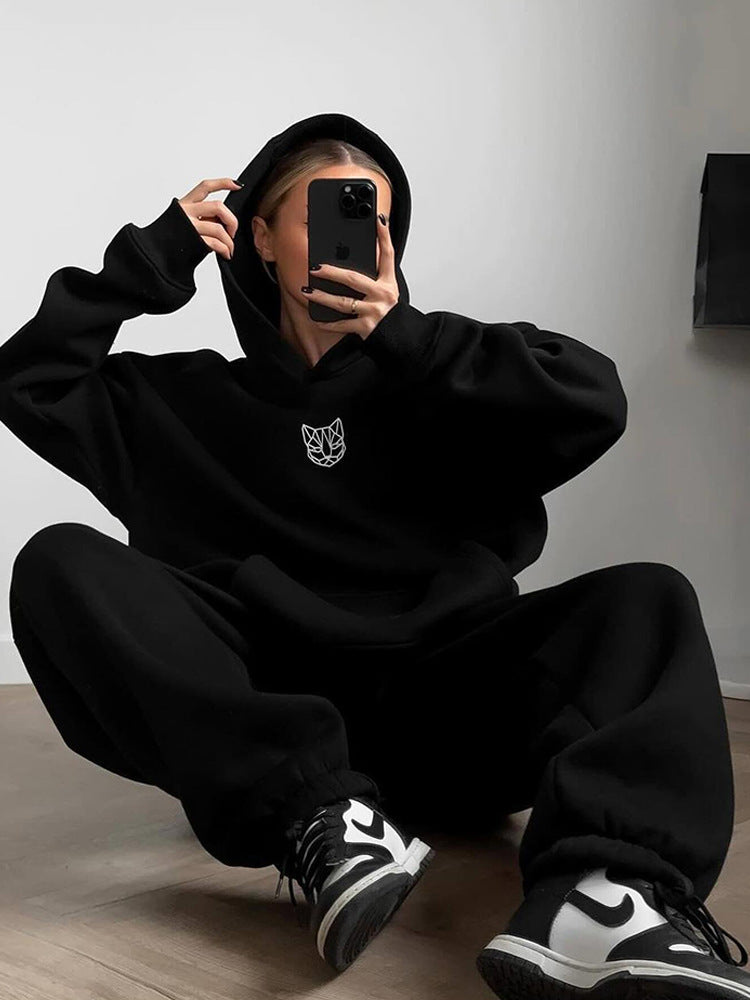 Kvinnors oversized hoodie med elastisk midja och bred skärning Mirla-Eva Jonsson