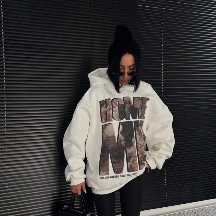 Kvinnors oversized hoodie med framträdande grafisk tryck Mirla-Eva Jonsson
