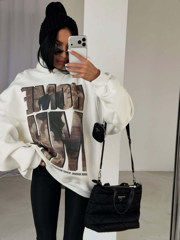Kvinnors oversized hoodie med framträdande grafisk tryck Mirla-Eva Jonsson