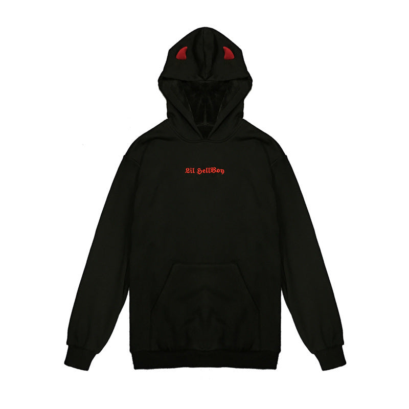 Kvinnors oversized hoodie med lekfulla vingapplikationer Mirla-Eva Jonsson
