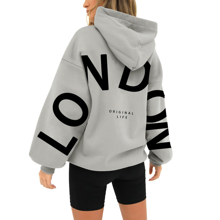 Kvinnors oversized hoodie med trendig London-print Mirla-Eva Jonsson