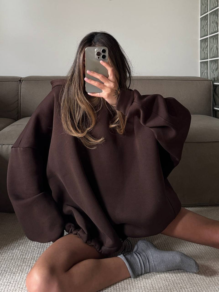 Kvinnors oversized hoodie med vida ärmar och ribbad nederkant Mirla-Eva Jonsson