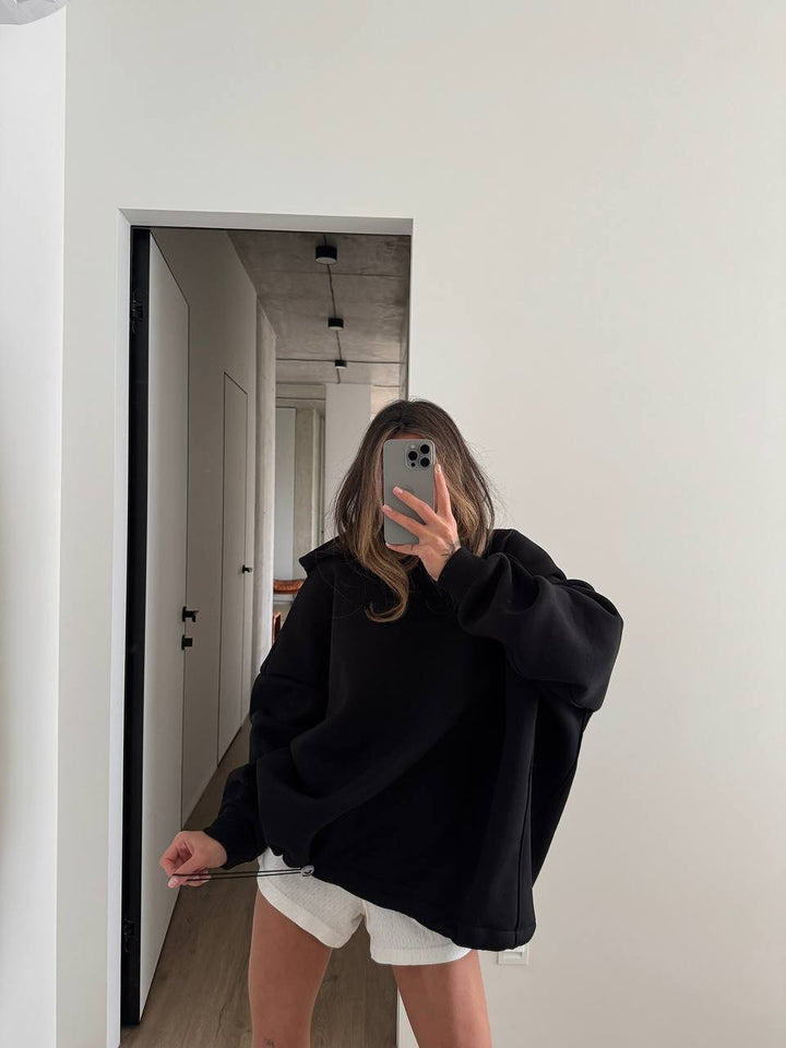 Kvinnors oversized hoodie med vida ärmar och ribbad nederkant Mirla-Eva Jonsson