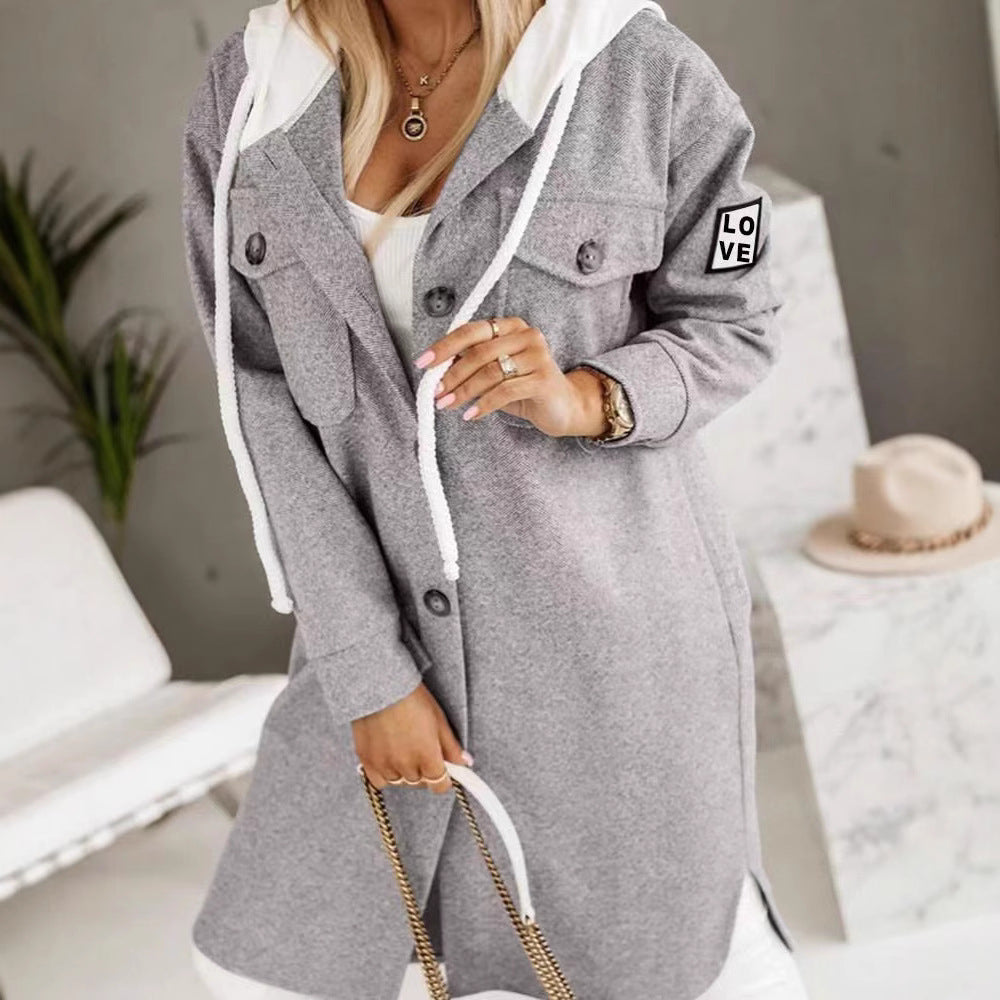 Kvinnors oversized hoodiejacka med stiliga knappp detaljer och fickor Mirla-Eva Jonsson