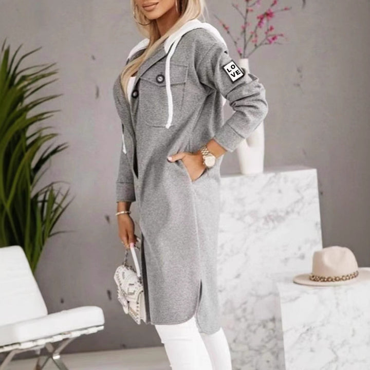 Kvinnors oversized hoodiejacka med stiliga knappp detaljer och fickor Mirla-Eva Jonsson