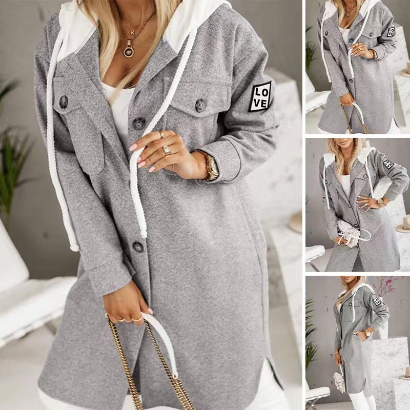 Kvinnors oversized hoodiejacka med stiliga knappp detaljer och fickor Mirla-Eva Jonsson