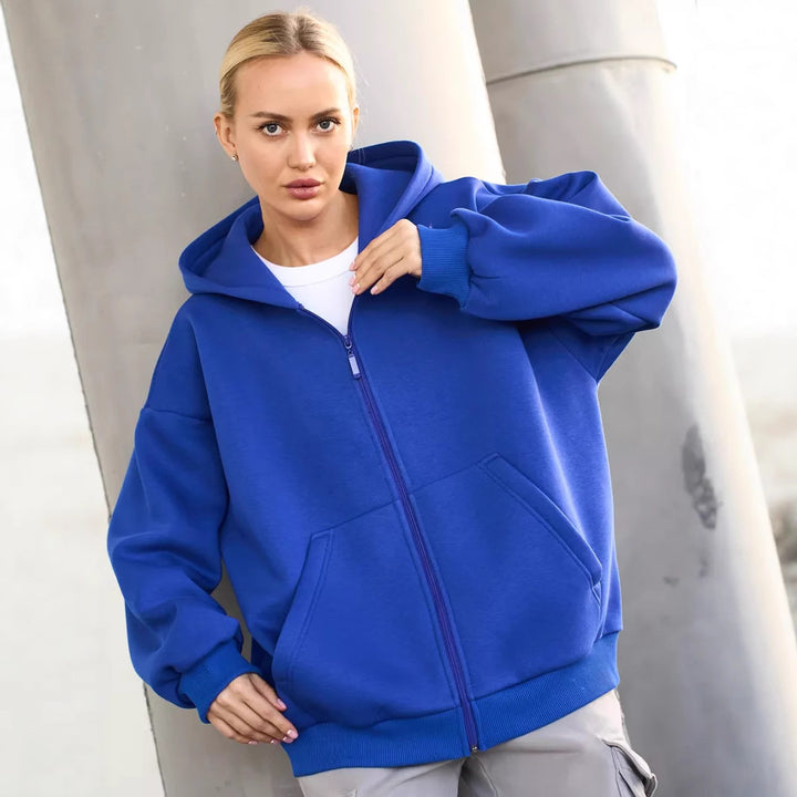Kvinnors oversized huva jacka med hel dragkedja och praktiska sidofickor Mirla-Eva Jonsson
