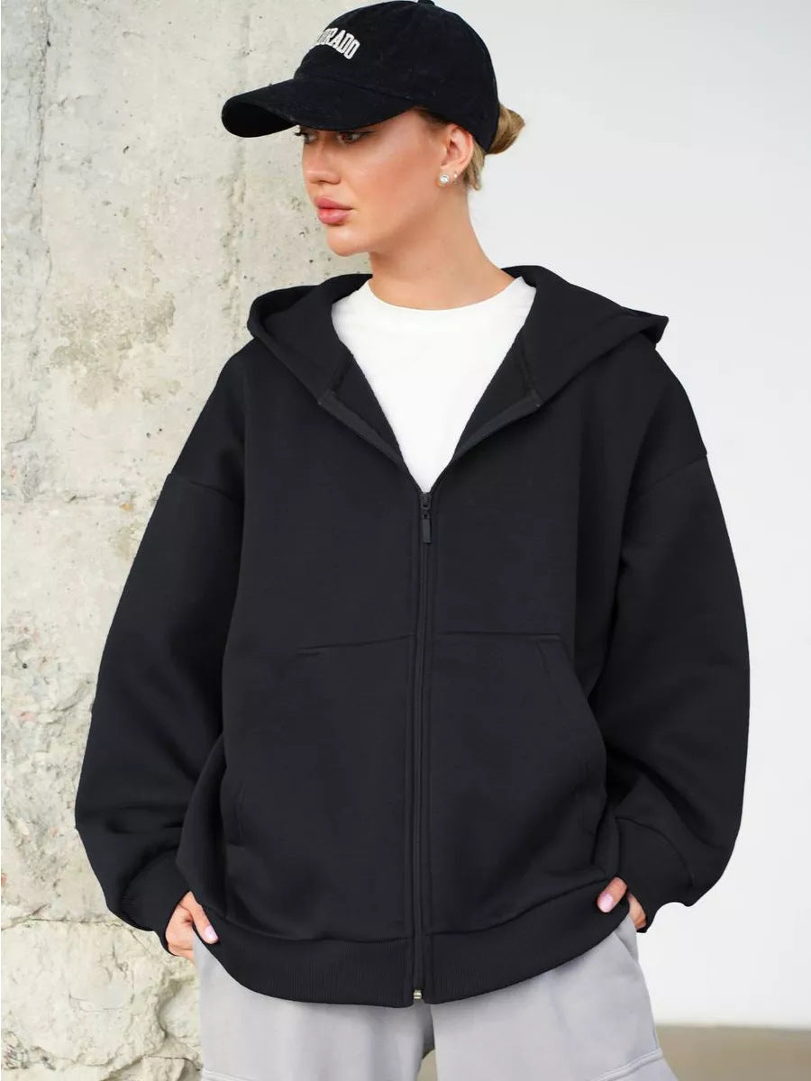 Kvinnors oversized huva jacka med hel dragkedja och praktiska sidofickor Mirla-Eva Jonsson