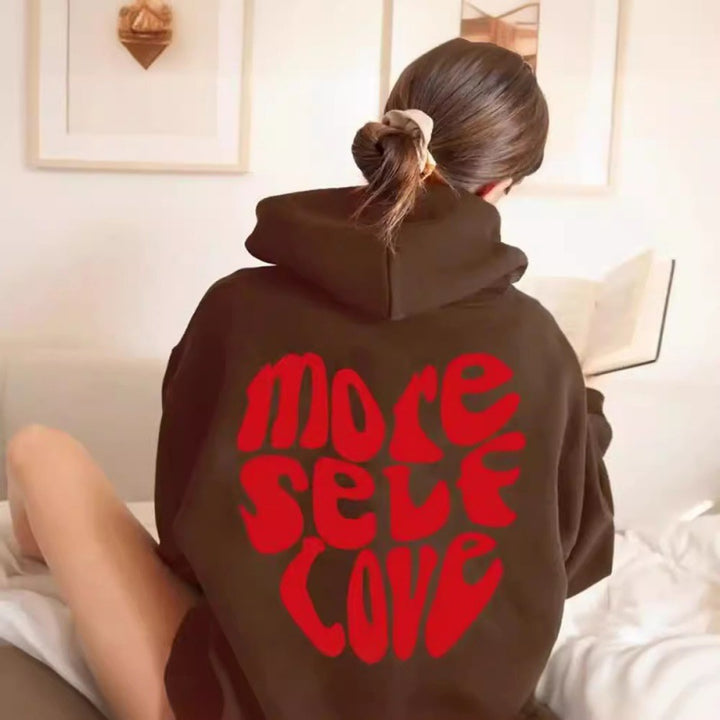 Kvinnors oversized huvtröja med kreativ hjärt-design Mirla-Eva Jonsson