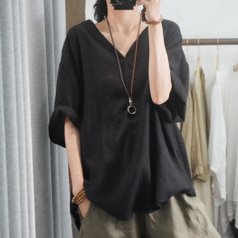 Kvinnors oversized linne T-shirt med V-hals och avslappnad passform Mirla-Eva Jonsson