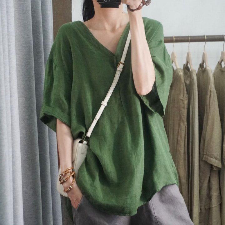Kvinnors oversized linne T-shirt med V-hals och avslappnad passform Mirla-Eva Jonsson