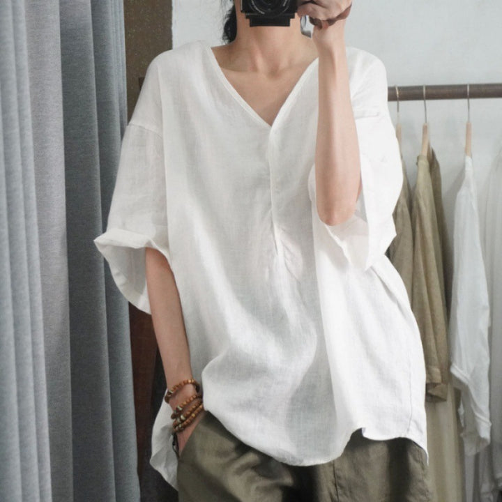 Kvinnors oversized linne T-shirt med V-hals och avslappnad passform Mirla-Eva Jonsson