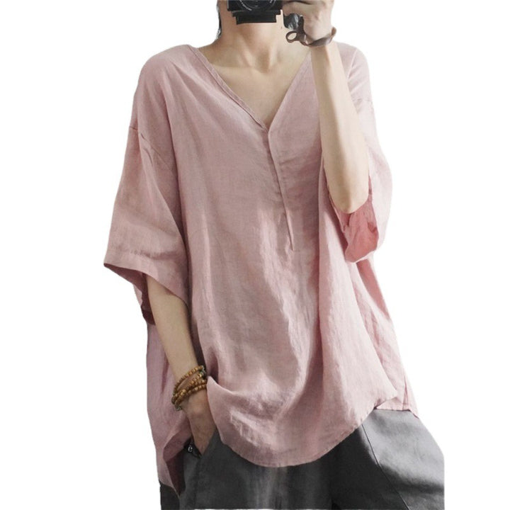 Kvinnors oversized linne T-shirt med V-hals och avslappnad passform Mirla-Eva Jonsson