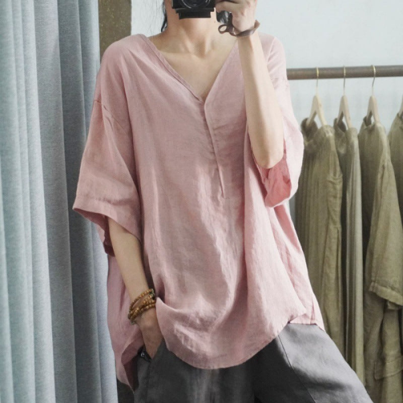 Kvinnors oversized linne T-shirt med V-hals och avslappnad passform Mirla-Eva Jonsson