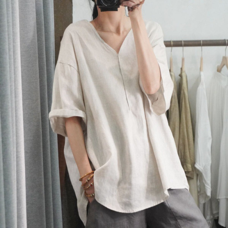 Kvinnors oversized linne T-shirt med V-hals och avslappnad passform Mirla-Eva Jonsson