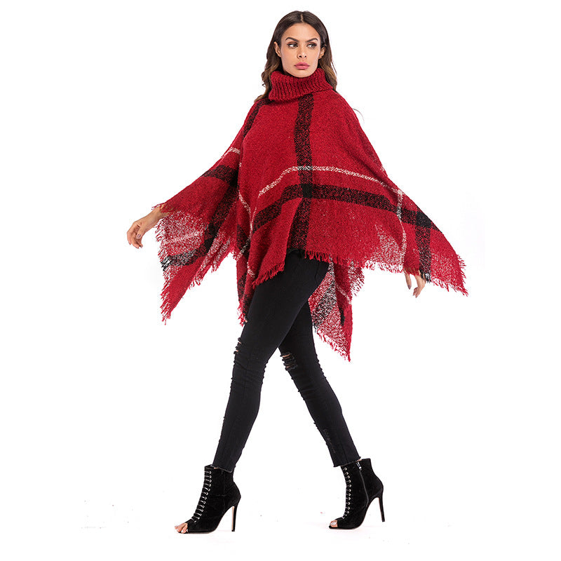 Kvinnors oversized poncho med rullkrage och avslappnad rutmönster Mirla-Eva Jonsson