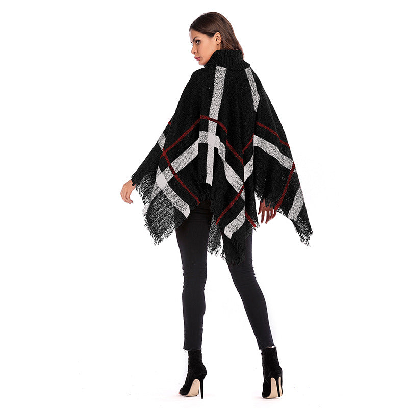 Kvinnors oversized poncho med rullkrage och avslappnad rutmönster Mirla-Eva Jonsson