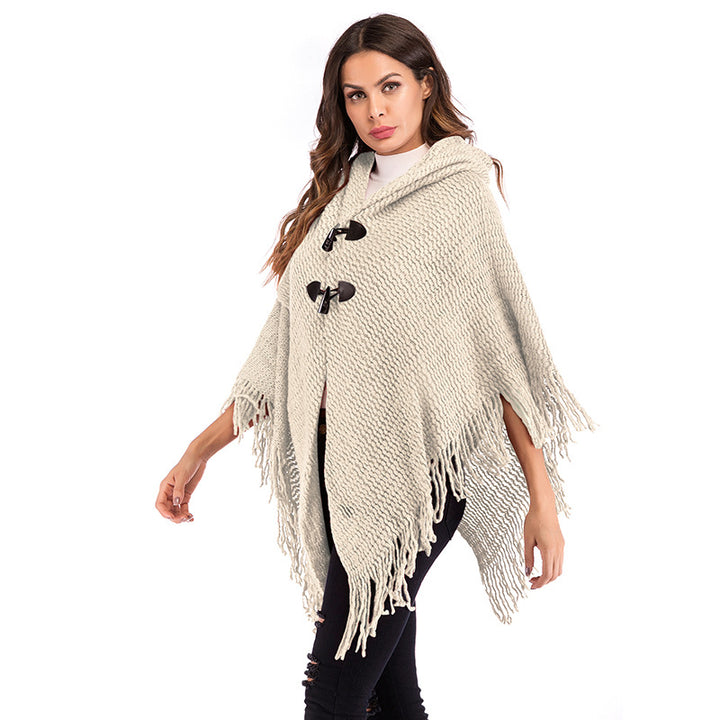 Kvinnors oversized poncho med rullkrage och avslappnad rutmönster Mirla-Eva Jonsson