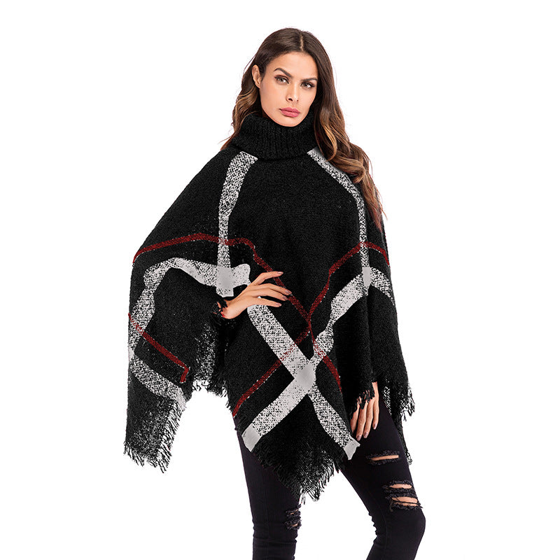Kvinnors oversized poncho med rullkrage och avslappnad rutmönster Mirla-Eva Jonsson
