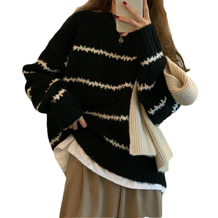 Kvinnors oversized pullover med randigt mönster och mjuk stickning Mirla-Eva Jonsson
