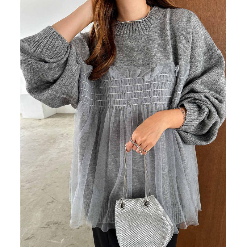 Kvinnors oversized pullover med volangdetaljer Mirla-Eva Jonsson