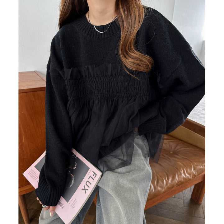 Kvinnors oversized pullover med volangdetaljer Mirla-Eva Jonsson