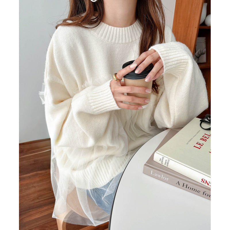 Kvinnors oversized pullover med volangdetaljer Mirla-Eva Jonsson