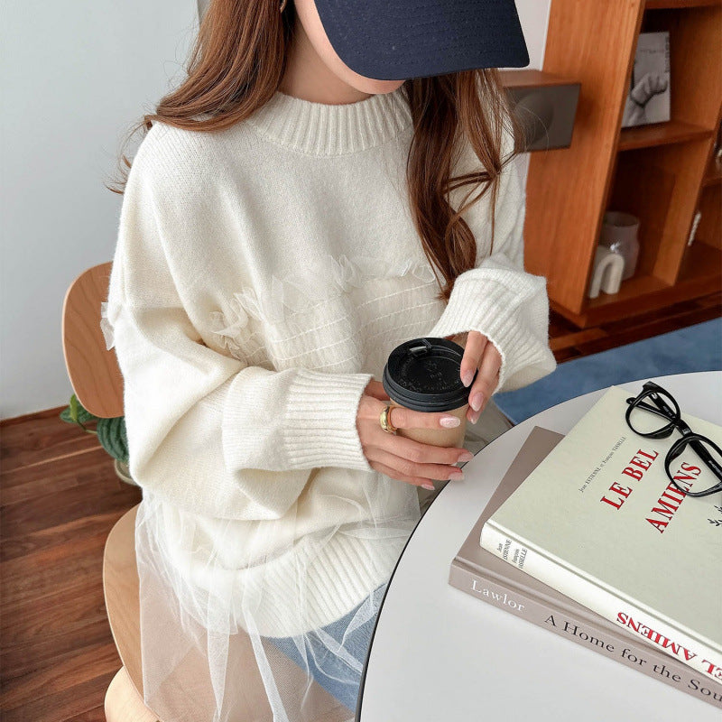 Kvinnors oversized pullover med volangdetaljer Mirla-Eva Jonsson