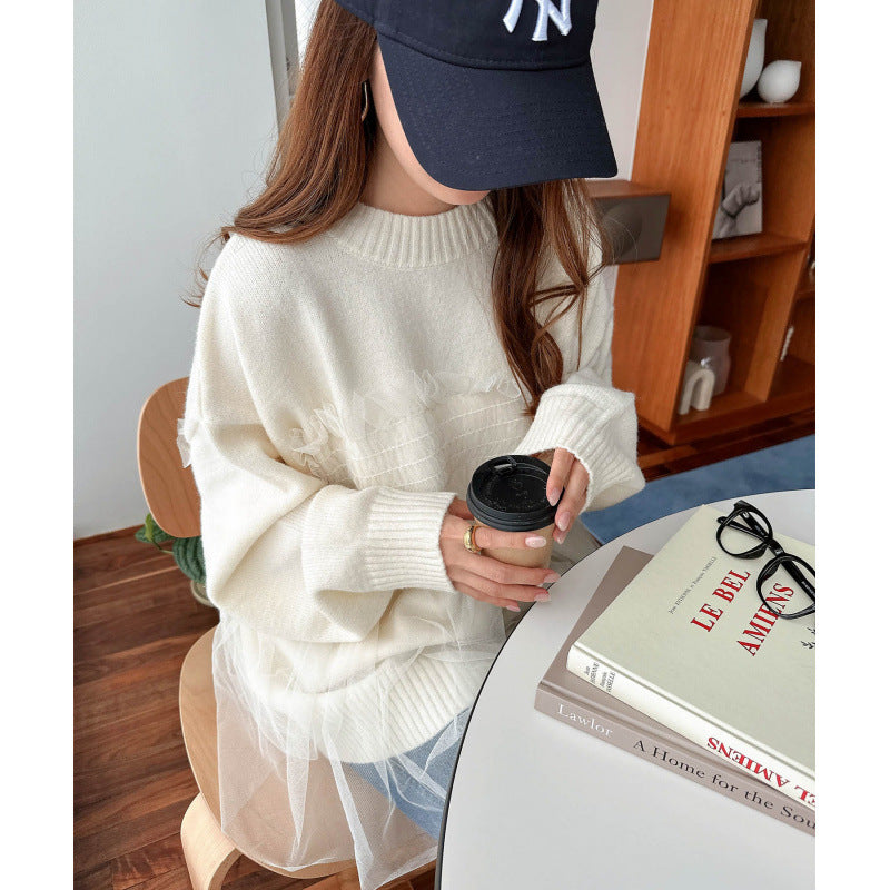 Kvinnors oversized pullover med volangdetaljer Mirla-Eva Jonsson
