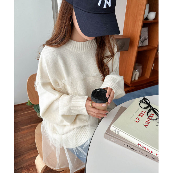 Kvinnors oversized pullover med volangdetaljer Mirla-Eva Jonsson