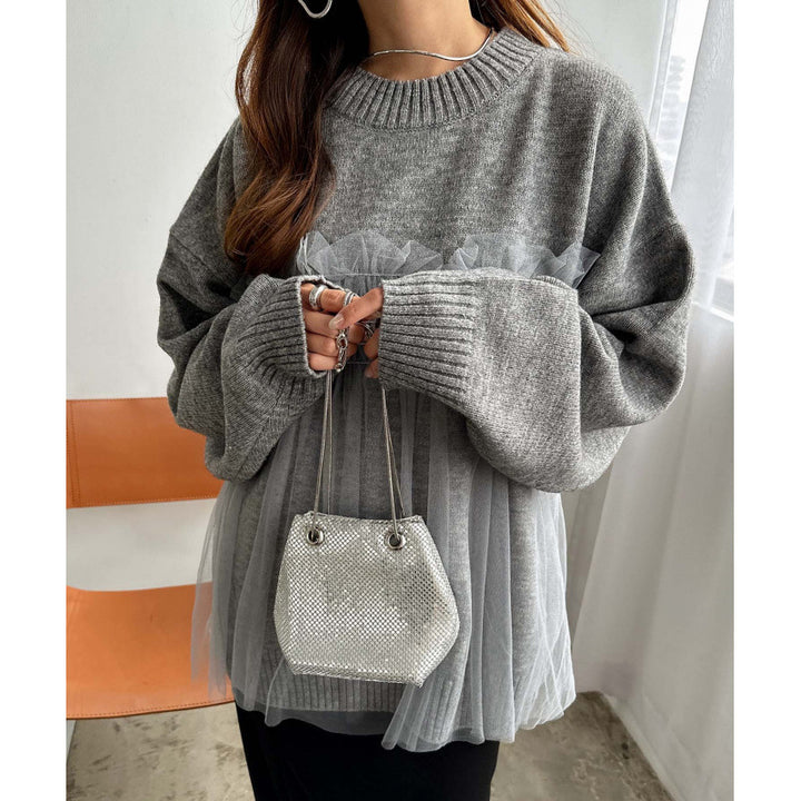 Kvinnors oversized pullover med volangdetaljer Mirla-Eva Jonsson