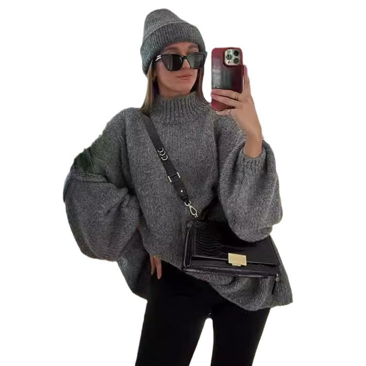 Kvinnors oversized stickad tröja med en mysig passform och moderna ärmar Mirla-Eva Jonsson