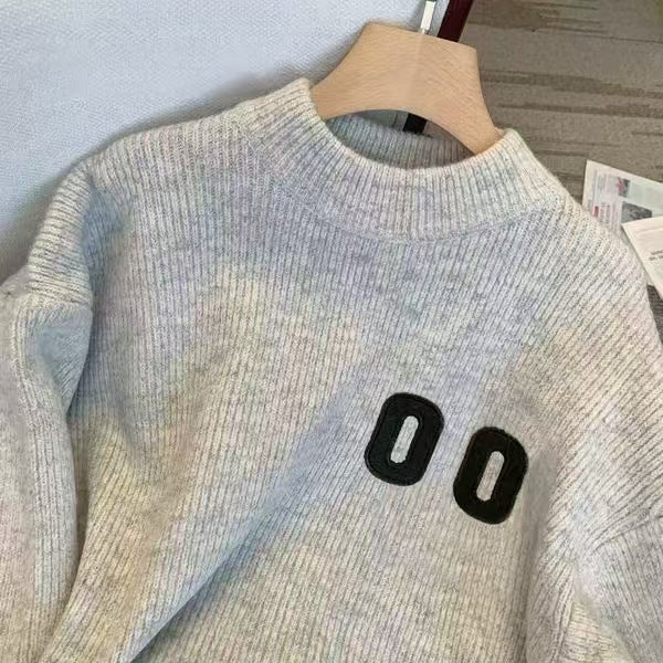 Kvinnors oversized stickad tröja med ribbad struktur Mirla-Eva Jonsson